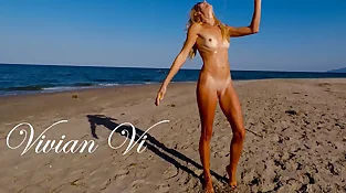 Bare Exercise on the beach -  a sexy bony cougar with smallish bumpers